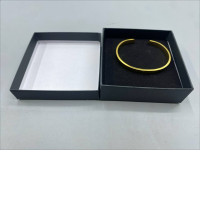 A bracelet in a black box.