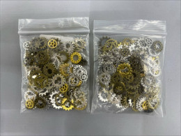 Set of 2 Metal gear parts, decorative ornaments, resin cases. Set of 2 Metal gear parts, decorative ornaments, resin cases.