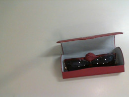 Women's sunglasses in a case