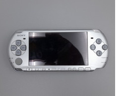 Sony PlayStation Portable (PSP) 3000 handheld console in Mystic Silver.  (NOT NEW)
