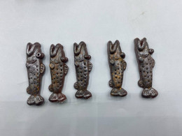 set of 5 Chopstick rest in the shape of a giant snakehead fish.