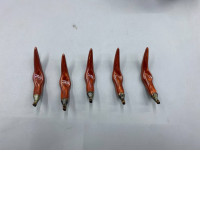 set of 5 Chopstick rest in the shape of a chili pepper.