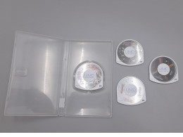 Set of 4 A collection of Universal Media Disc (UMD) discs for the Sony PlayStation Portable (PSP).