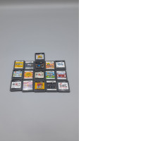 Set of 16 His collection of Nintendo DS game cartridges includes many Japanese games.