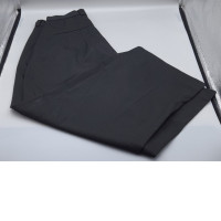 Black long trousers by Dunhill.