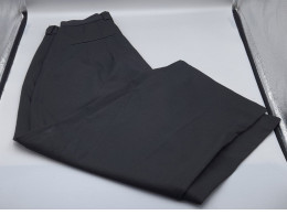 Black long trousers by Dunhill. Black long trousers by Dunhill.