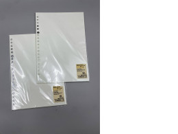 Set of 2 MUJI brand individual refill sheets for notebooks.