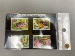 collectible set of Thai postage stamps featuring various bee species. 