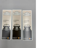 Set of 3 Ahmad Tea brand tags featuring a "London taxi" design.