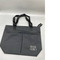 A black fabric bag with the "SIAM AERO" logo. A black fabric bag with the "SIAM AERO" logo.