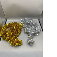 Set of 2 Decorative garlands made from shimmering silver and gold fibers.