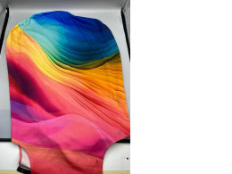 Rainbow patterned luggage cover.