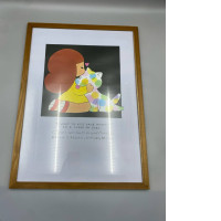 A framed cartoon print, a request for repayment, is the work of artist Wisut Ponnimith.