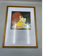 A framed cartoon print, a request for repayment, is the work of artist Wisut Ponnimith.