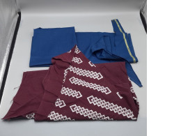 Set of 3 Scraps of blue and dark brown fabric.