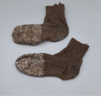 Traditional hand-knitted wool socks, dark green.
