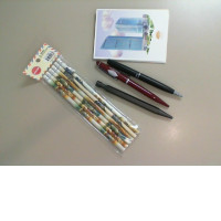 A stationery set consisting of simple pencils, 3 pens and 1 notepad A stationery set consisting of simple pencils, 3 pens and 1 notepad