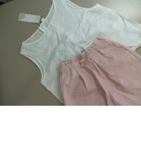 Children's set of pink shorts and a white blouse Children's set of pink shorts and a white blouse