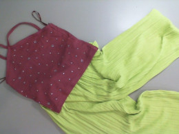 Children's set, green pants and a red top Children's set, green pants and a red top