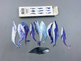 Set of 10  whale-themed bookmarks. 