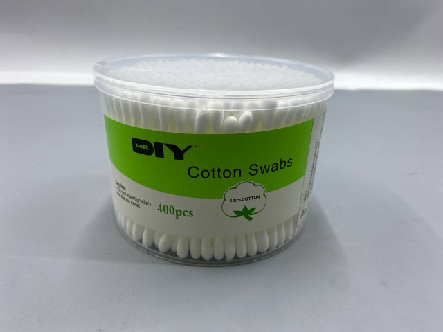 container of MR.D.I.Y cotton swabs. container of MR.D.I.Y cotton swabs.