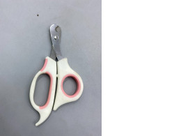 pair of pet nail clippers, commonly used for trimming the claws of cats, dogs, rabbits, and other small animals. 