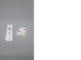 Set of 2 set of POTENTATE brand watercolor paper bookmarks, featuring floral designs and a "Japanese Food Doodles" thematic notepad. 