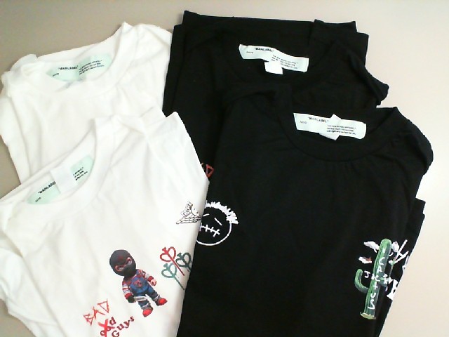 Set of 4 T-shirts: 2 white, 2 black Set of 4 T-shirts: 2 white, 2 black