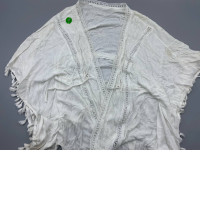 A jacket or coat to wear over another garment.