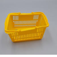 Yellow plastic children's toy basket. Yellow plastic children's toy basket.