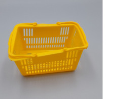 Yellow plastic children's toy basket.