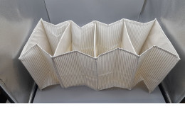 Zara Home striped cotton clothes organizer designed for storing and separating garments. 