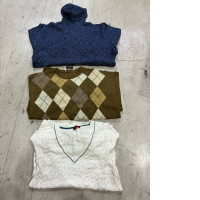 A set of three  sweaters