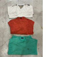 A set of three wide-collar sweaters