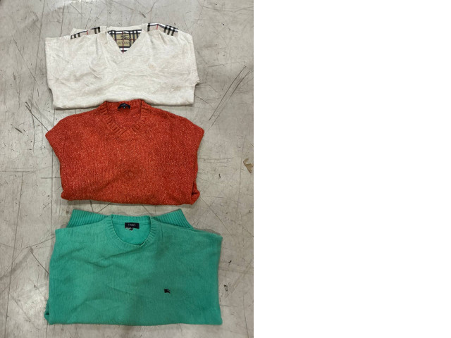 A set of three wide-collar sweaters A set of three wide-collar sweaters