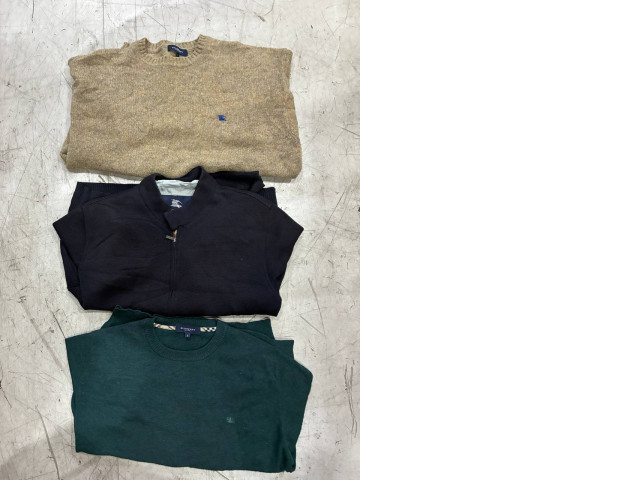 A set of three sweaters A set of three sweaters