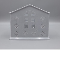 House-shaped wall holder for toothbrushes or soap.