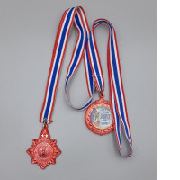 Set of 2 The medal is believed to be bronze due to its attractive color.