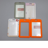 Set of 5 vertical plastic ID card holders designed for work permits or badges. 