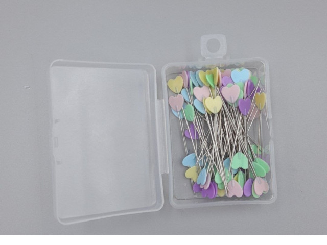 pastel-colored, heart-shaped straight quilting pins, often packaged in a clear plastic container. pastel-colored, heart-shaped straight quilting pins, often packaged in a clear plastic container.