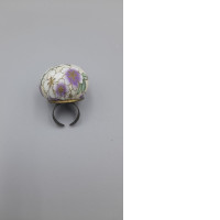 adjustable ring pin cushion used for holding sewing pins while working. adjustable ring pin cushion used for holding sewing pins while working.