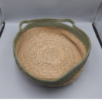 woven cat bed basket featuring a natural jute rope base and olive green cotton rope sides with handles. woven cat bed basket featuring a natural jute rope base and olive green cotton rope sides with handles.