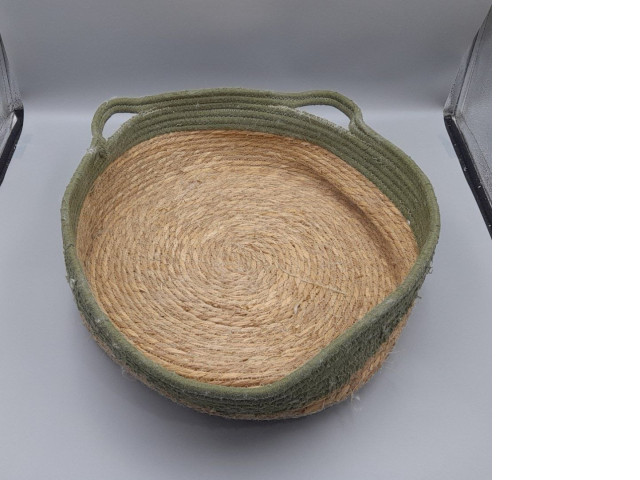woven cat bed basket featuring a natural jute rope base and olive green cotton rope sides with handles. woven cat bed basket featuring a natural jute rope base and olive green cotton rope sides with handles.